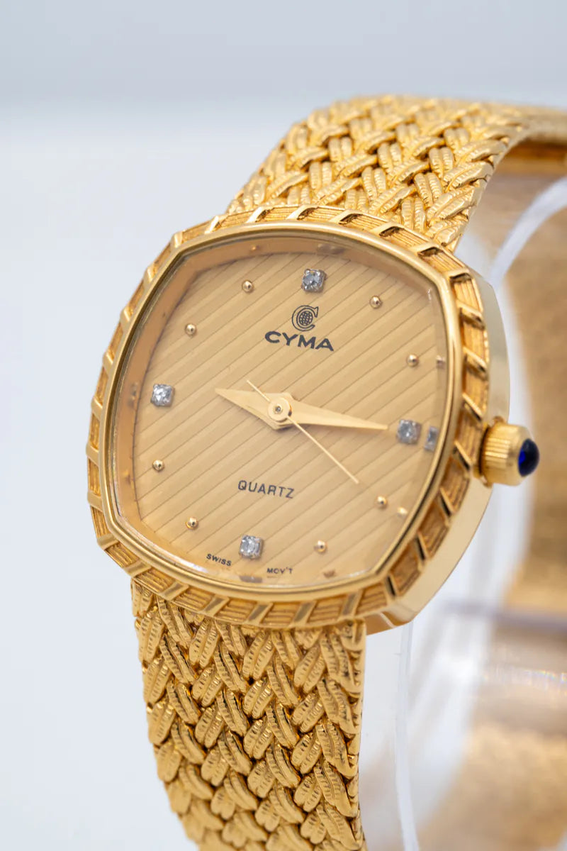 CYMA Vintage Yellow Plated Square Dial 20mm quartz watch in yellow gold-plated, featuring woven bracelet and diagonal-textured dial, front view