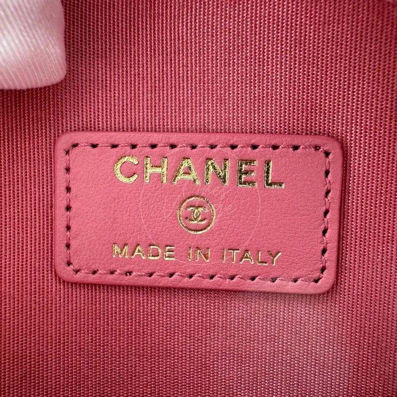 Chanel round clutch bag in pink camellia-embossed caviar leather with gold hardware, Series 29, Chanel Made in Italy leather label