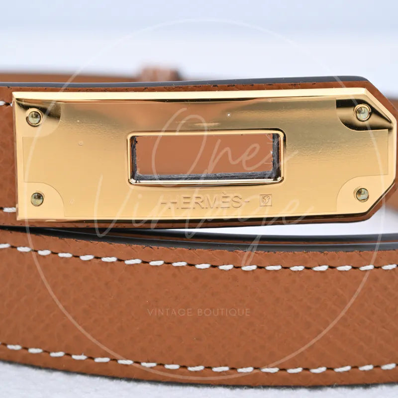 Hermès Kelly Belt with gold-tone hardware, gold-tone buckle plate and engraved Hermès logo detail