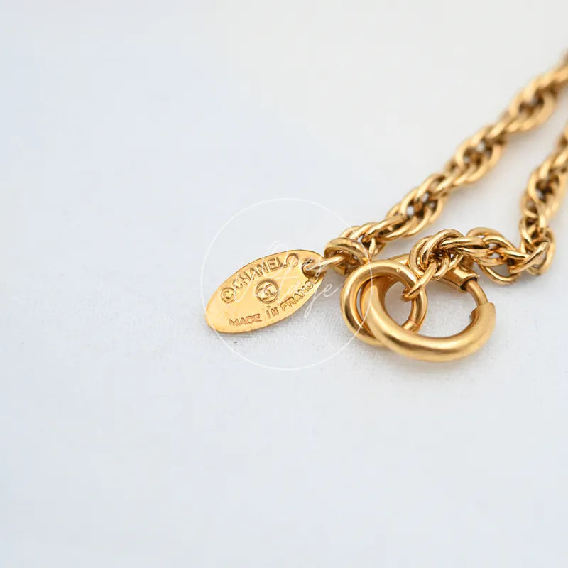 Chanel CC Pendant Necklace, circular clasp and interlinked chain detail