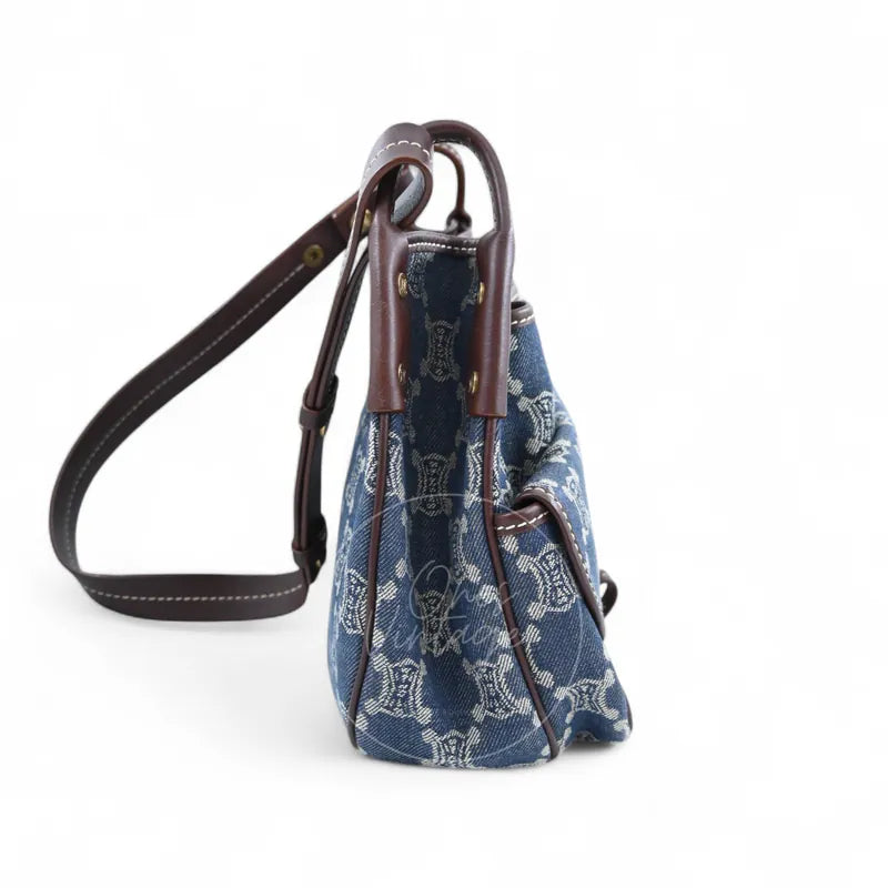 Celine Macadam Shoulder Bag in blue denim with gold-tone hardware, featuring monogram-patterned denim with leather shoulder strap, right side view