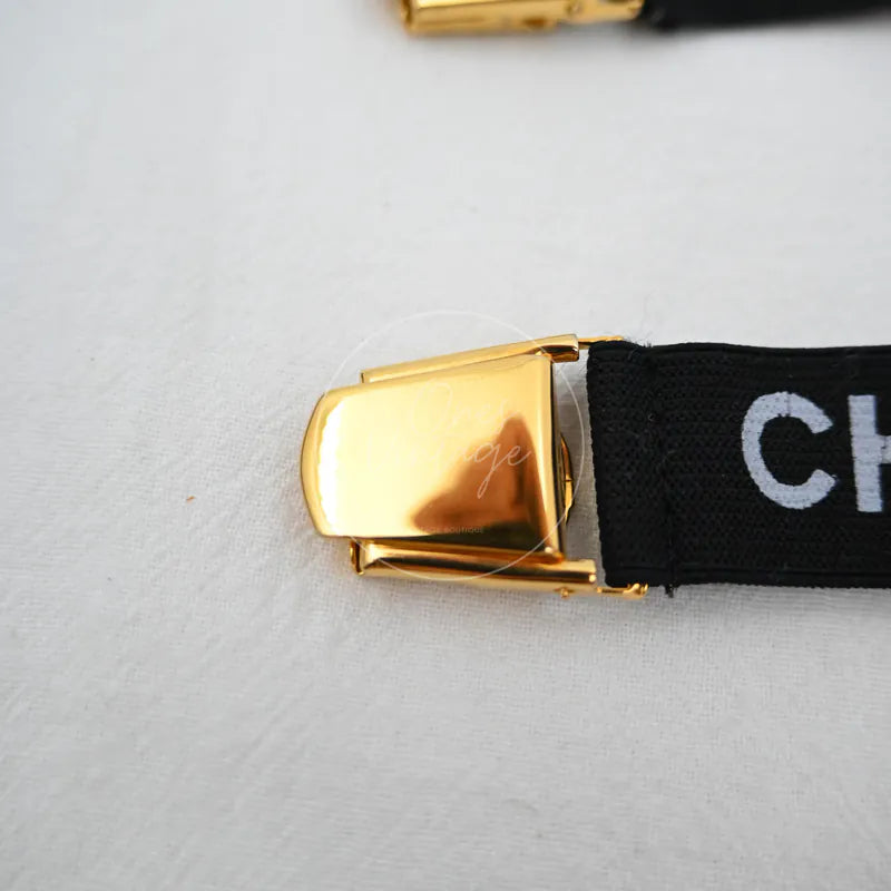 Chanel Logo-jacquard Armbands, Black woven strap and Gold-tone strap-end hardware detail