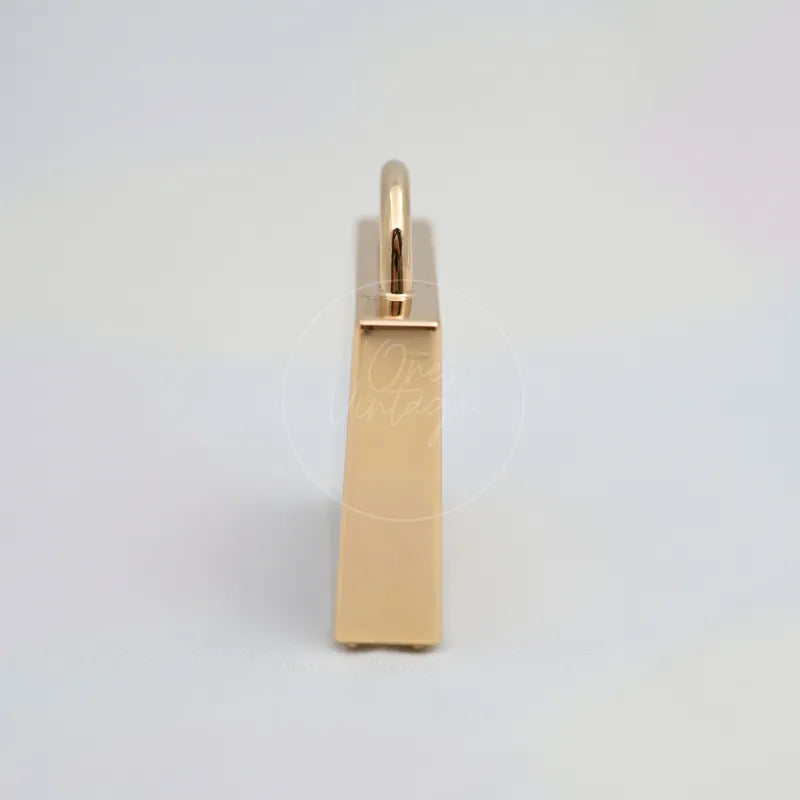 Hermès Kelly Charm and, Rectangular padlock body and Arched shackle detail