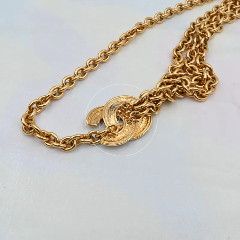 Chanel Vintage CC Mark Belt Waist Chain, interlocking chain links and round disc charms detail