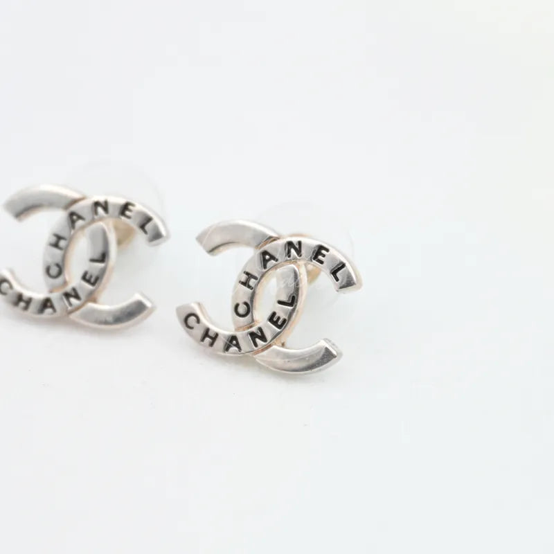 Chanel CC Mark With Black Front Stud Earrings in silver-plated metal, featuring interlocking CC design and contrasting dark lettering, front view