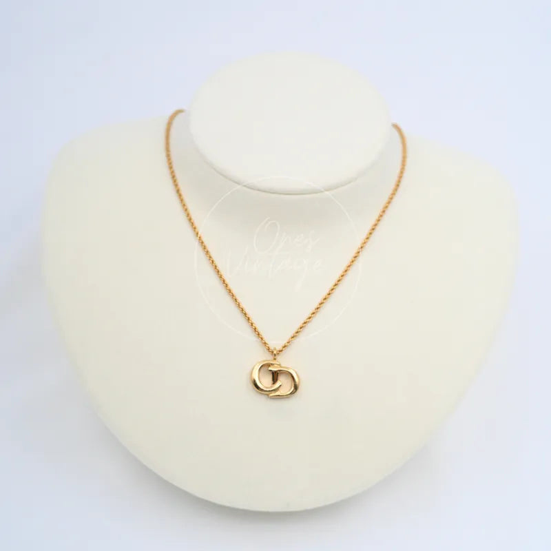 Dior Out-of-print Carriage CD logo Necklace in metal with plated gold, featuring interlocking CD logo pendant and fine chain, front view