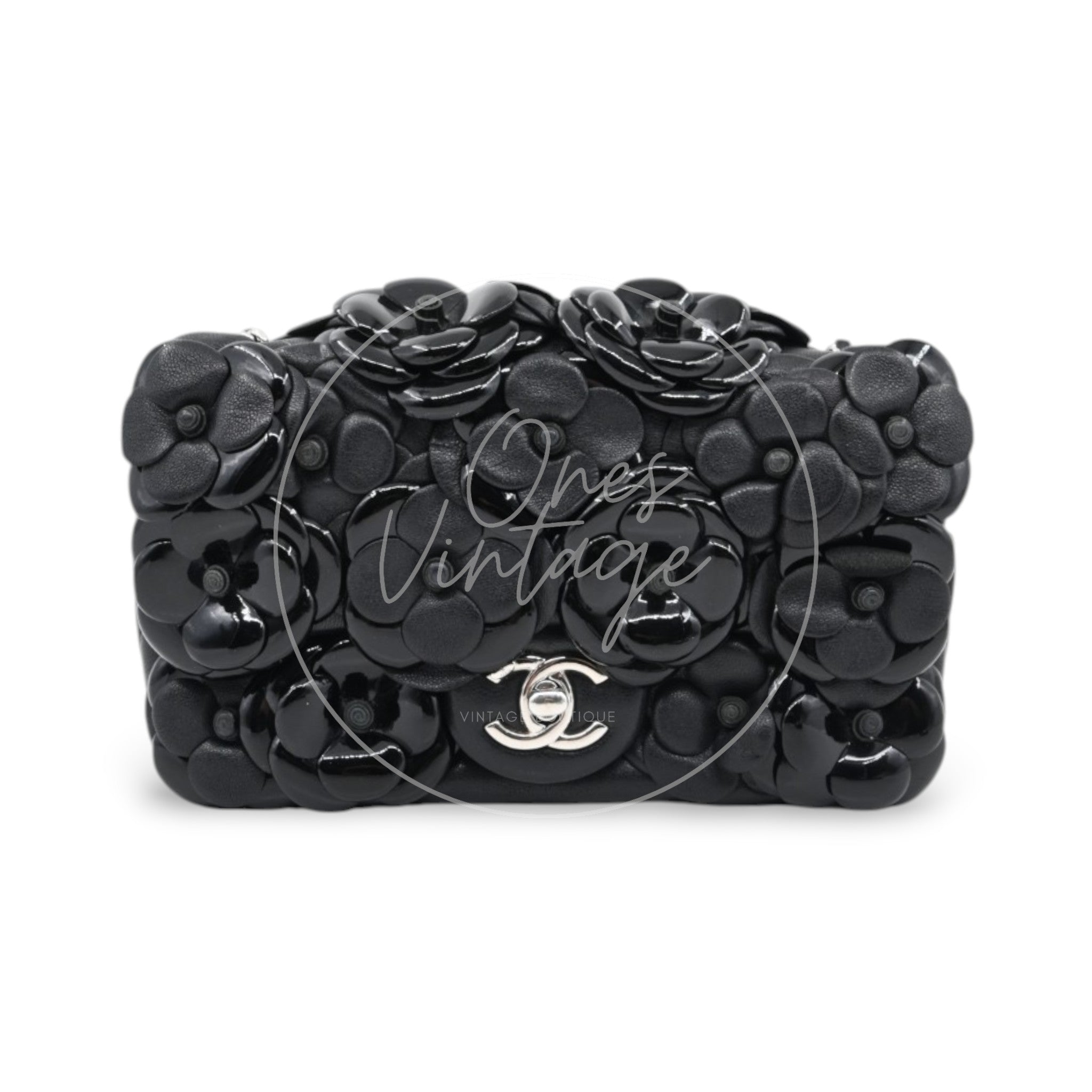 Chanel black leather and patent camellia embellished flap bag with silver-tone CC clasp