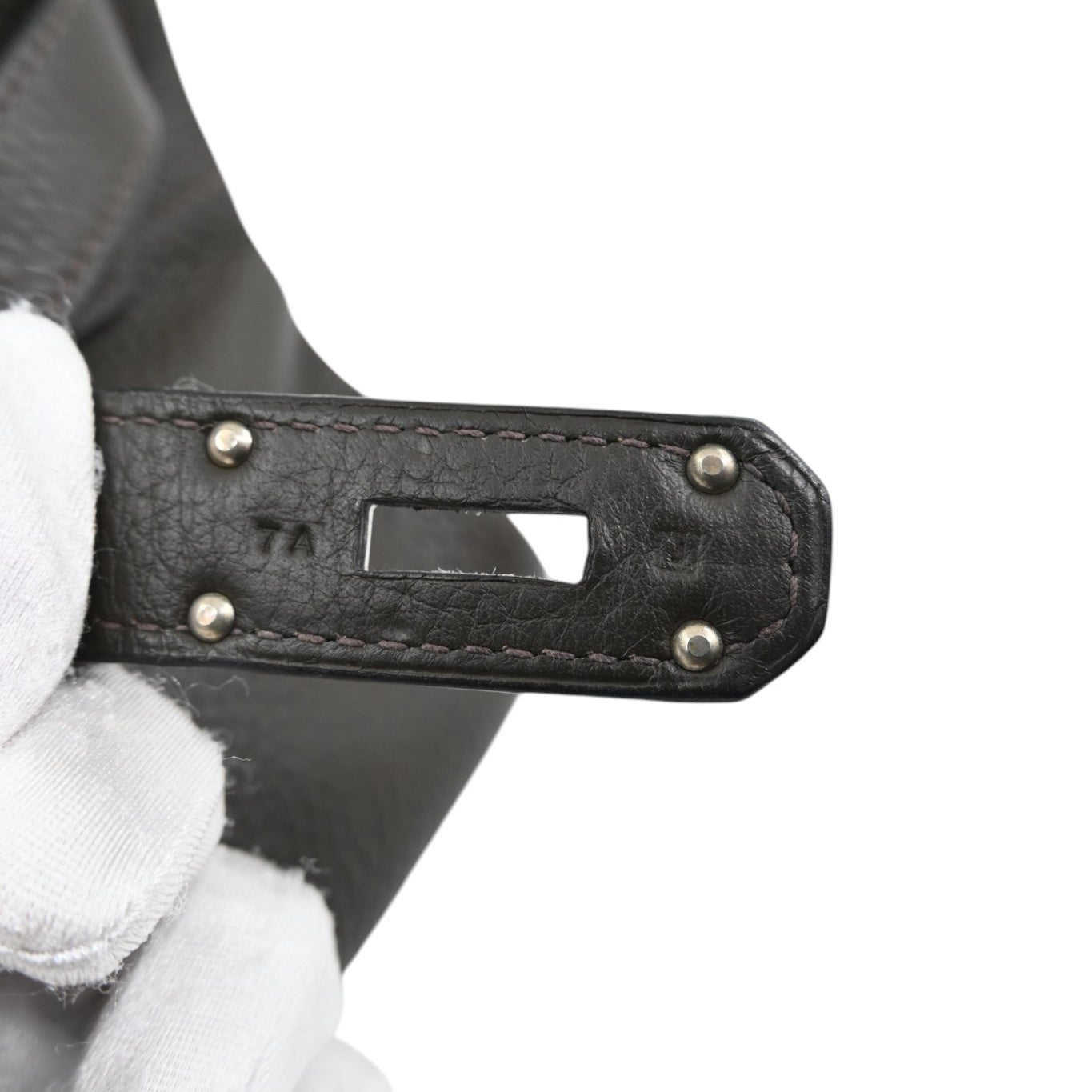 Hermes Birkin blind stamp and artisan code details on the leather strap