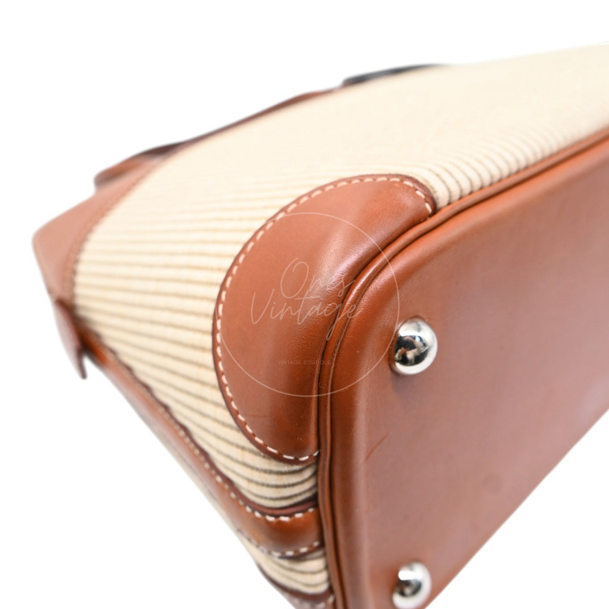 Hermès Bolide 26 in Fauve Barenia leather and Crinoline fabric with palladium-plated hardware, Square D stamp, rear left base corner and protective feet