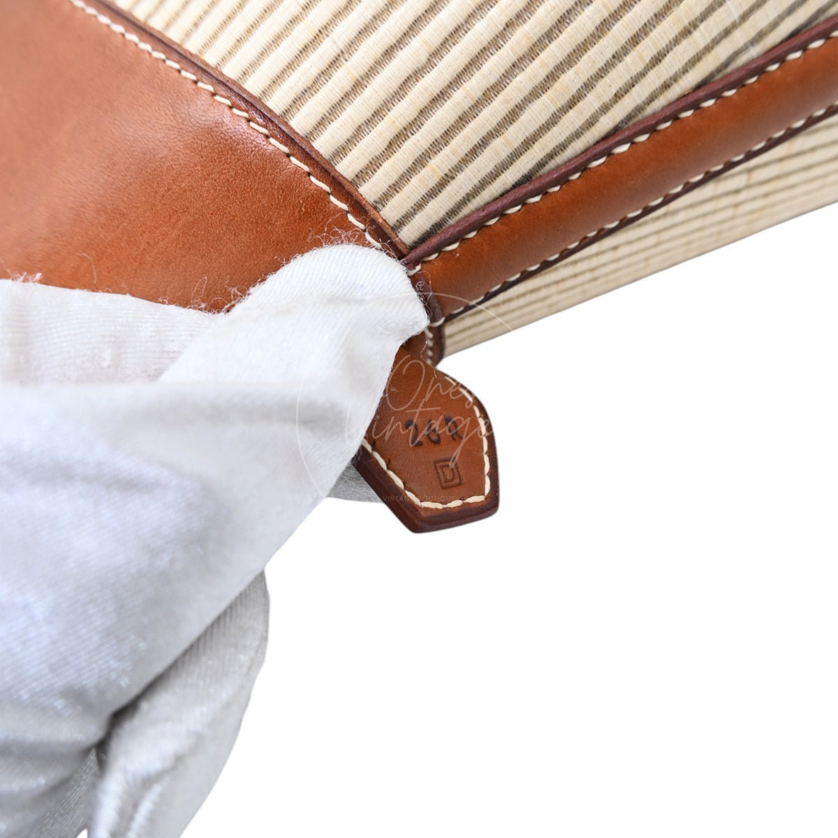 Hermès Bolide 26 in Fauve Barenia leather and Crinoline fabric with palladium-plated hardware, Square D stamp, fabric-and-leather seam close-up