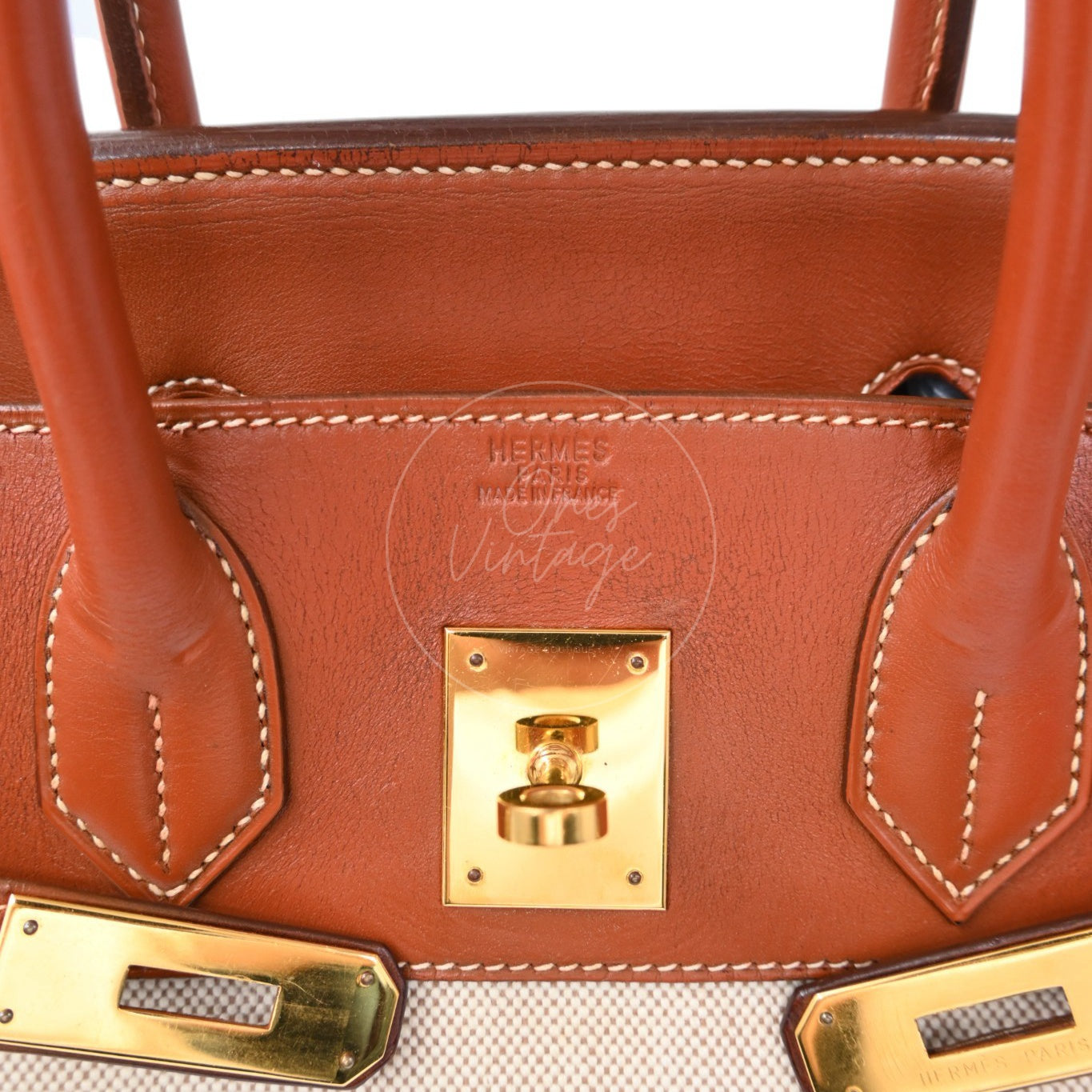Hermès Haut à Courroies 32 in Fauve Barenia leather and beige toile with gold-tone hardware, Circle X stamp, Hermès Paris stamp and turn-lock mechanism