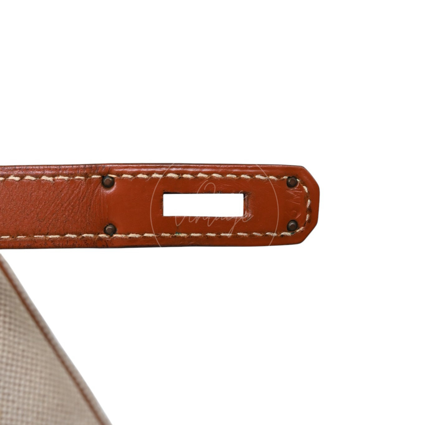 Hermès Haut à Courroies 32 in Fauve Barenia leather and beige toile with gold-tone hardware, Circle X stamp, underside of the left closure strap with Circle X stamp