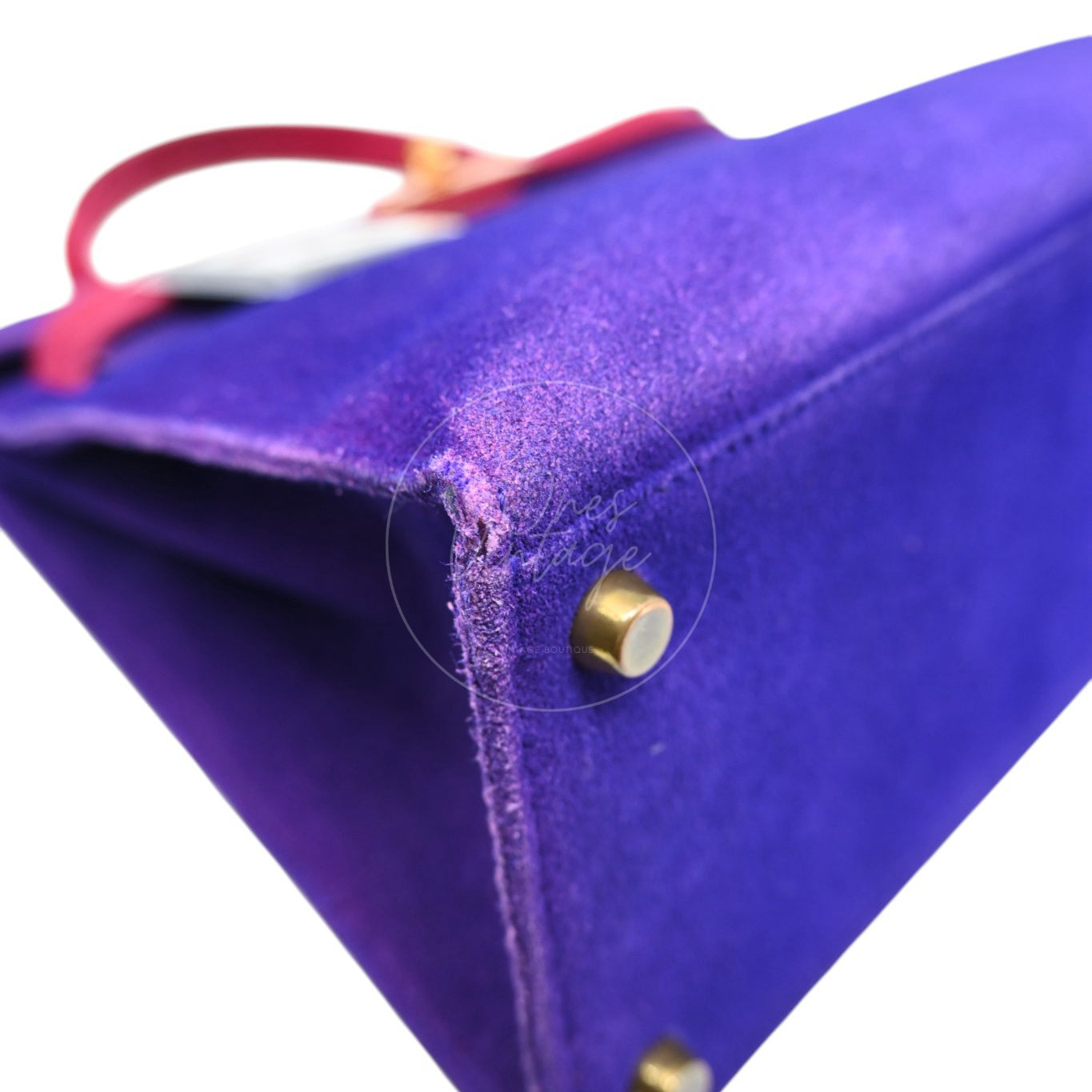 Hermès Kelly 28 Sellier in violet and pink Doblis suede with gold-tone hardware, front left base corner and protective foot