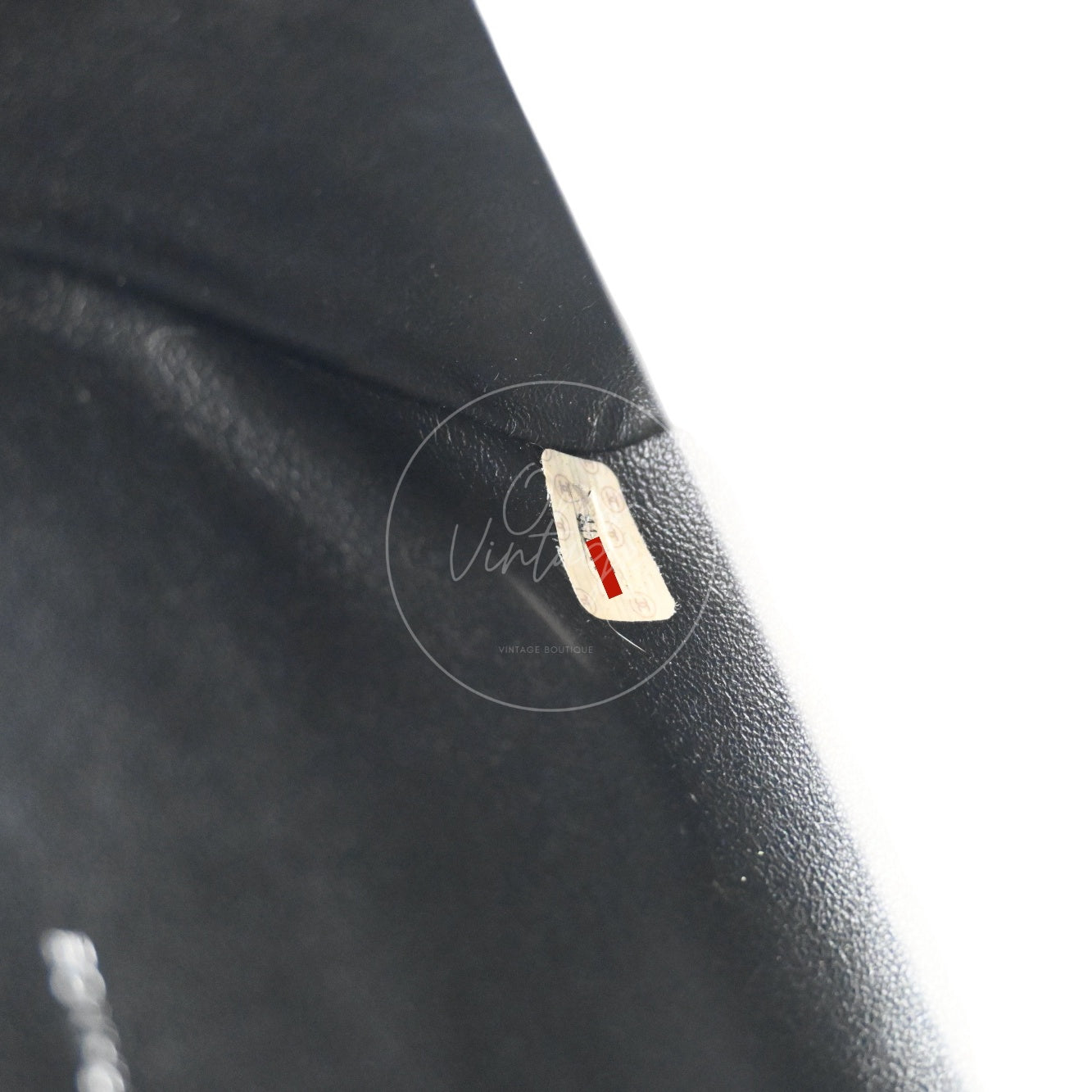 Chanel vintage 4 serial number hologram sticker with CC pattern inside leather lining