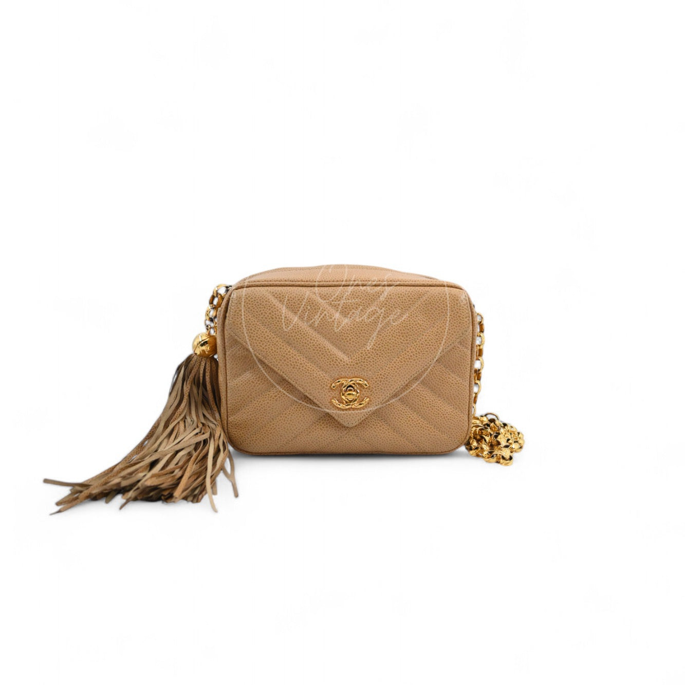 Chanel Vintage Chevron Caviar leather camera bag in beige with tassel charm front view