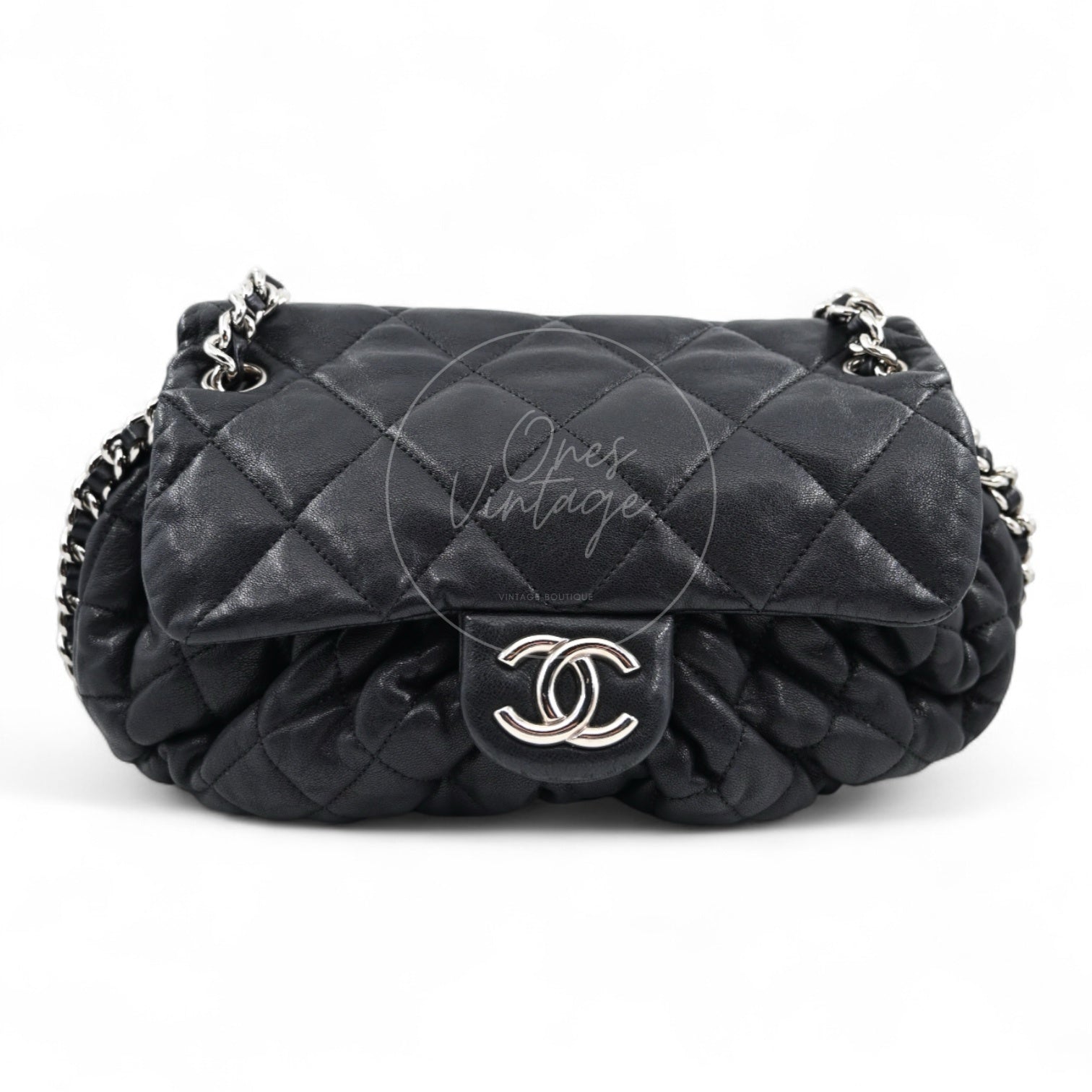 Chanel Bubble Quilt flap bag in black lambskin with puffy quilting and silver-tone CC lock front view