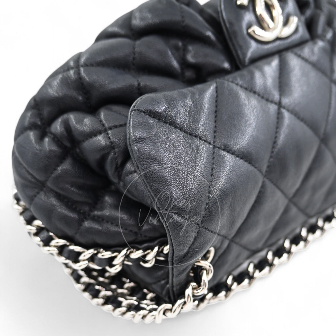 Side view of Chanel vintage bubble quilt bag showing puffy leather texture and corners