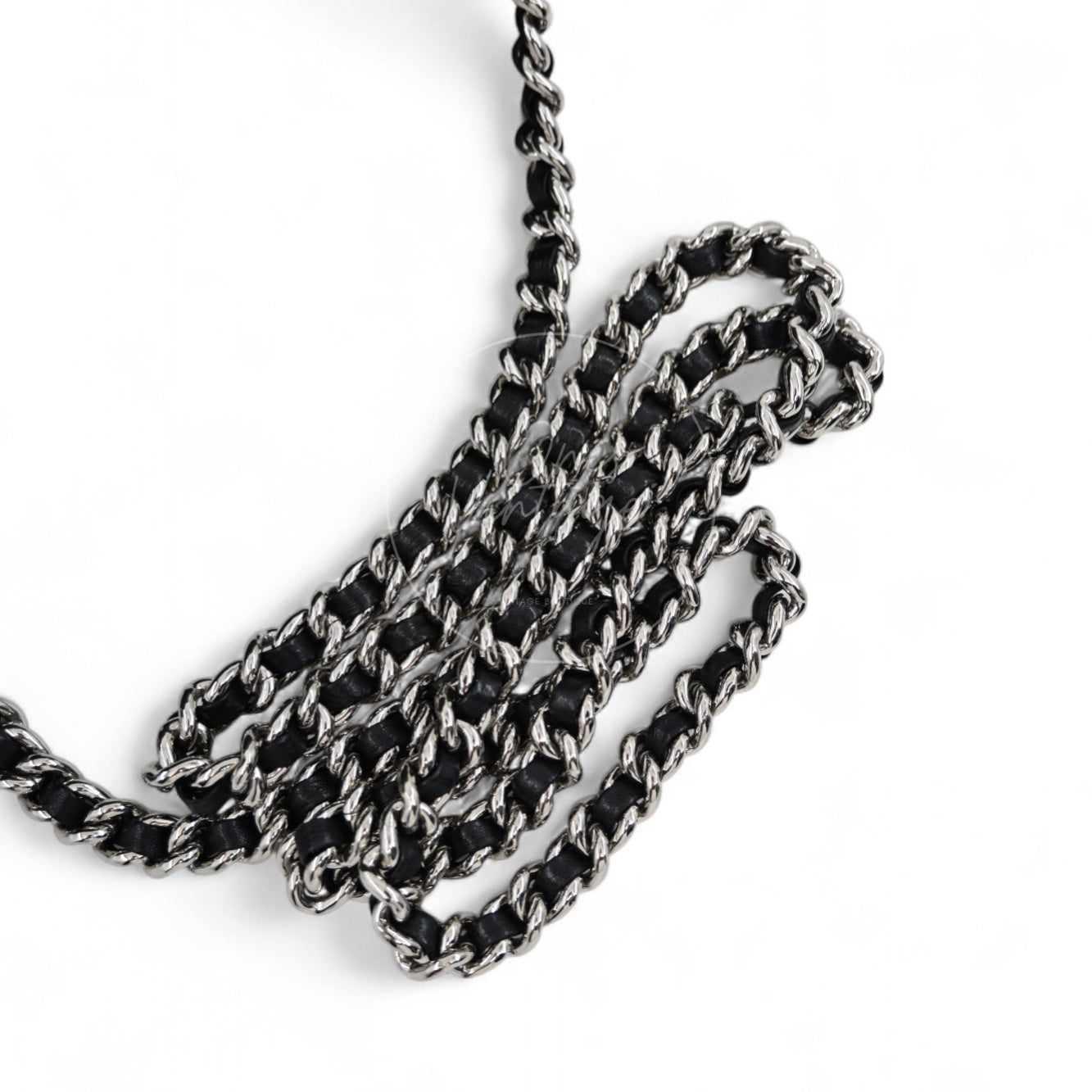 Chanel classic silver-tone metal and black leather interwoven chain shoulder strap detail