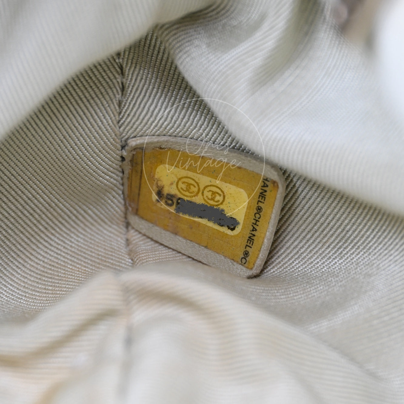 Chanel vintage 15-series serial number hologram sticker inside light grey fabric lining