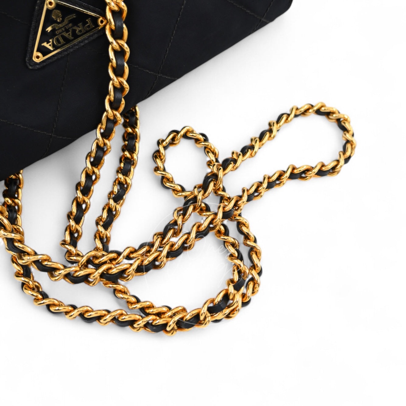 Prada classic gold-tone metal and black leather interwoven chain shoulder strap detail