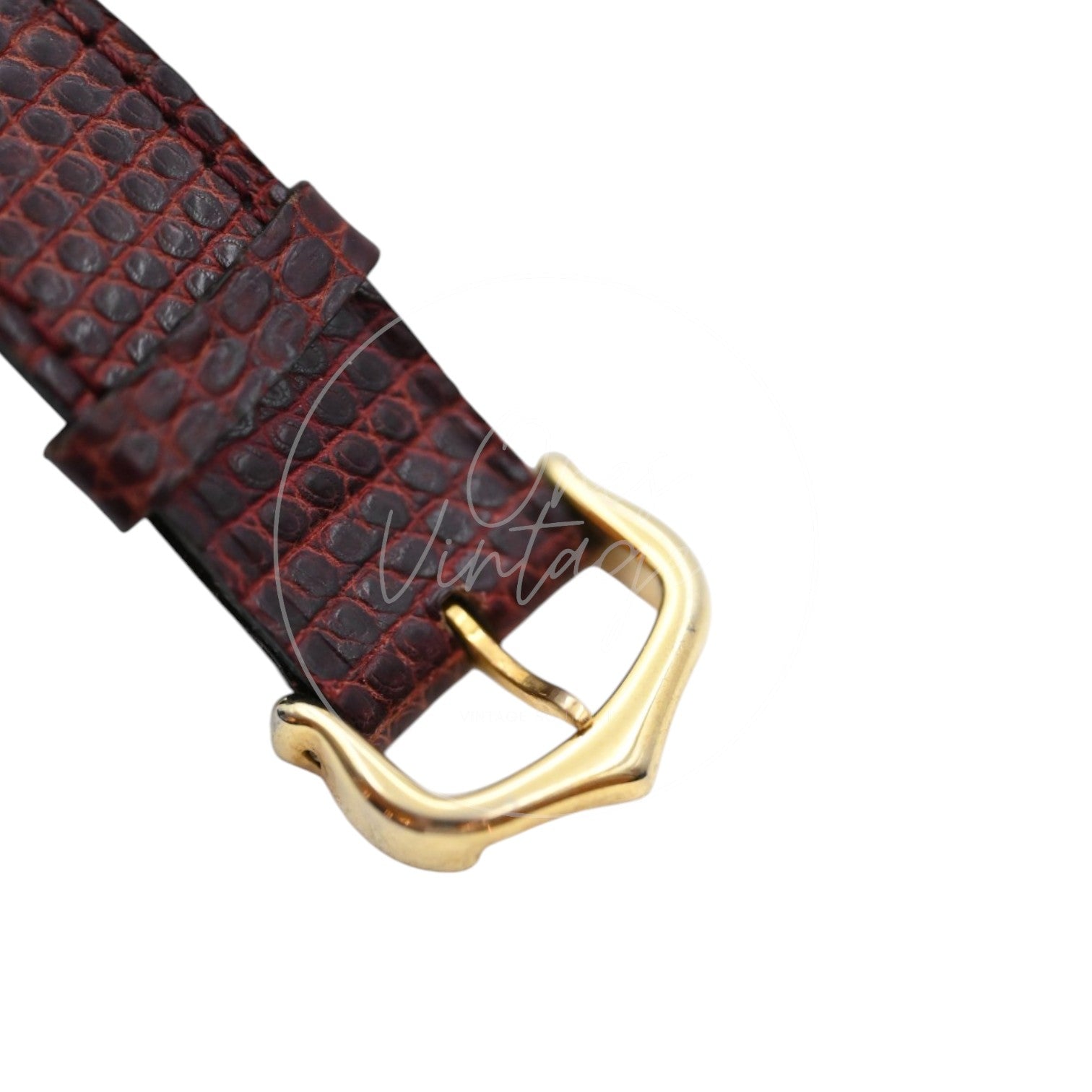 Cartier Must de Tank Trinity dial quartz watch with maroon lizard-pattern strap, maroon lizard-pattern strap and gold-tone Cartier buckle close-up