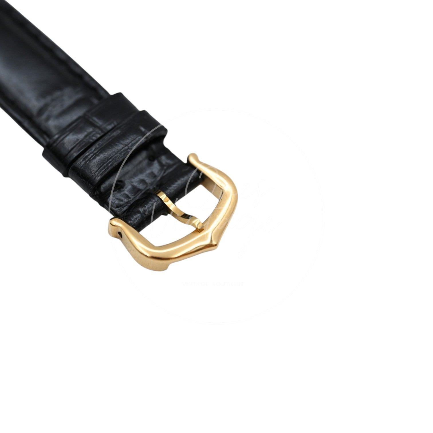 Cartier Must de Tank quartz watch with ivory Roman numeral dial and black leather strap, black leather strap and gold-tone Cartier buckle close-up