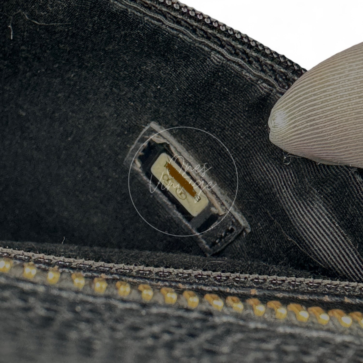 Chanel vintage serial number hologram sticker with CC monogram pattern inside lining