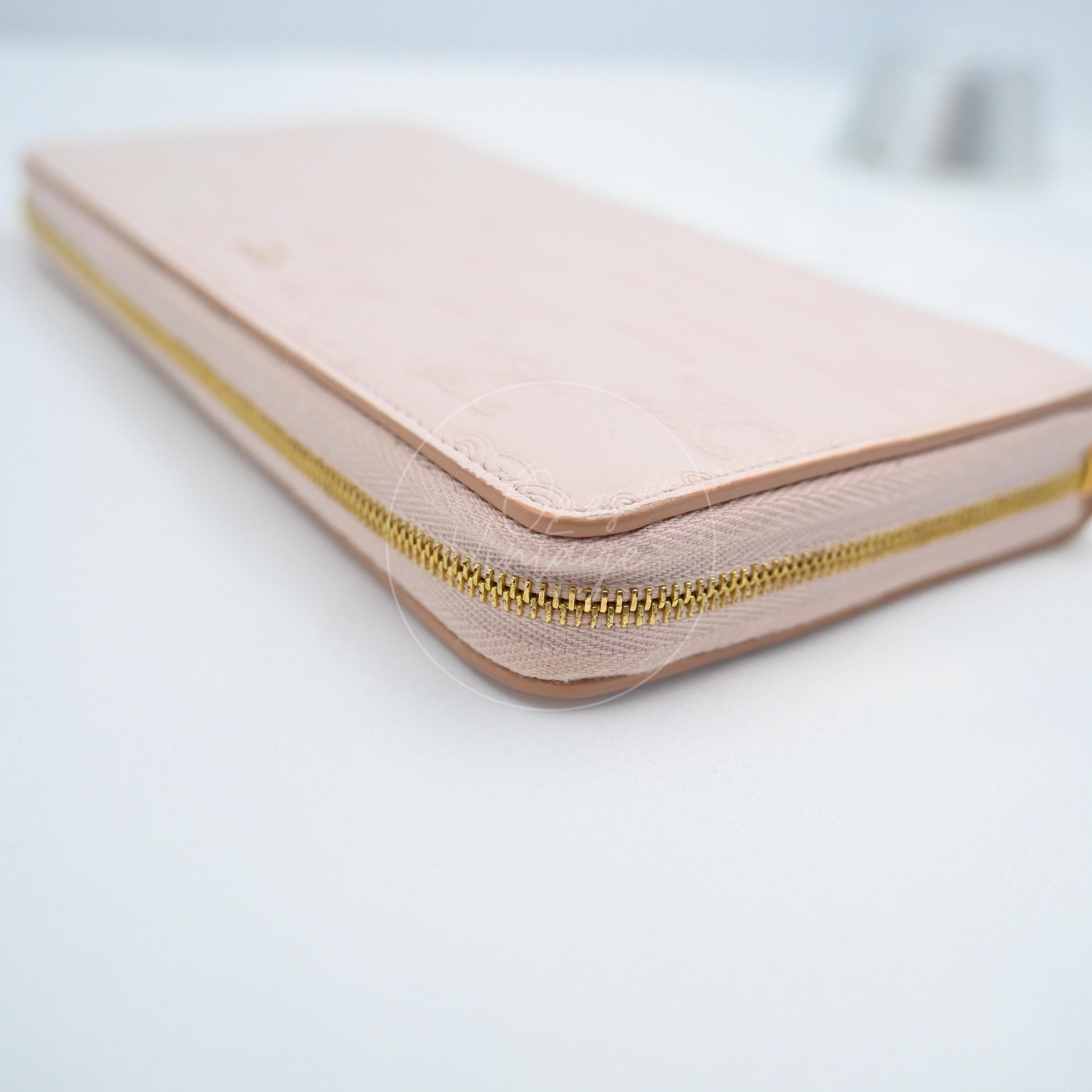 [Pre-owned] Celine Triomphe Embossed Pink Calfskin Zippy Long Wallet