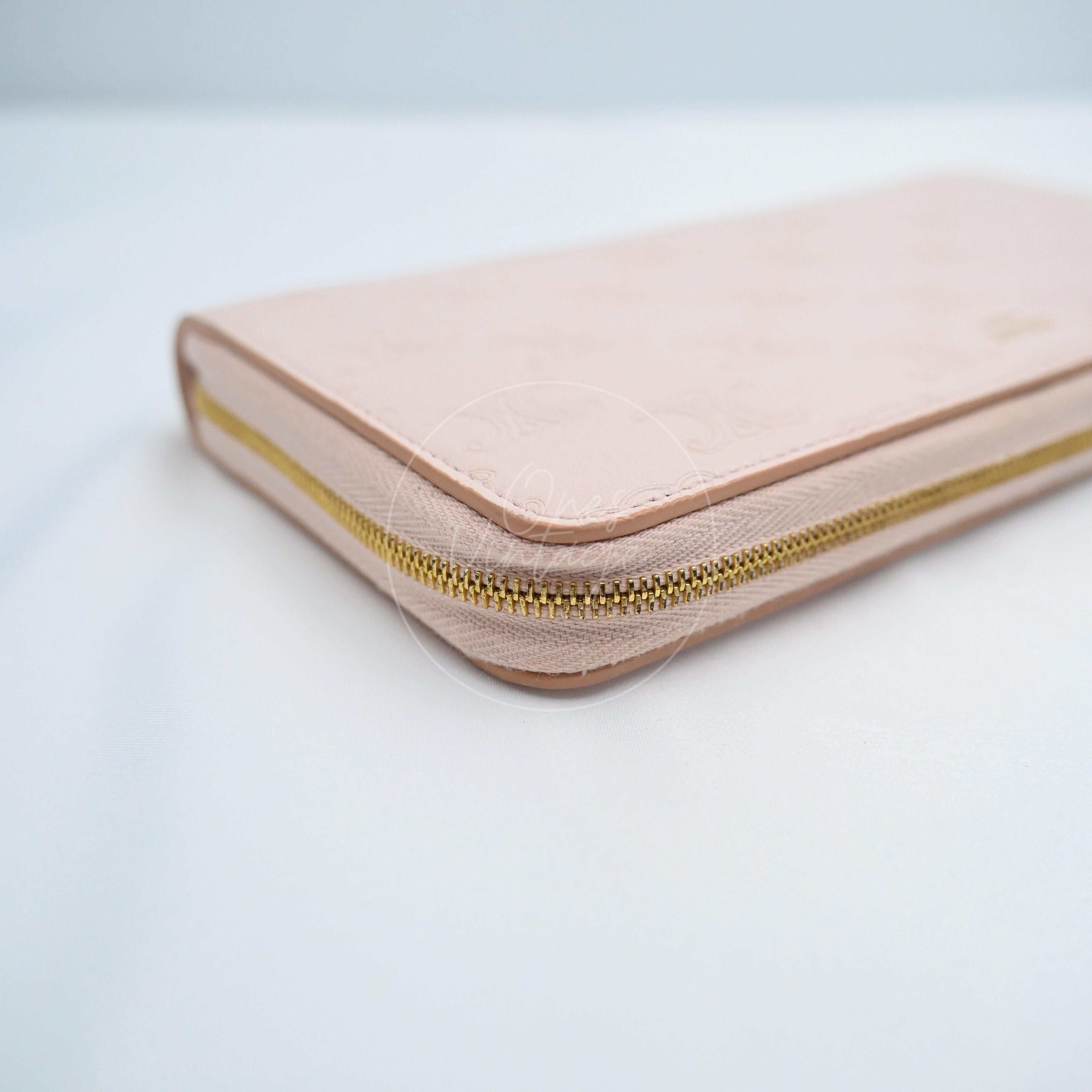 [Pre-owned] Celine Triomphe Embossed Pink Calfskin Zippy Long Wallet