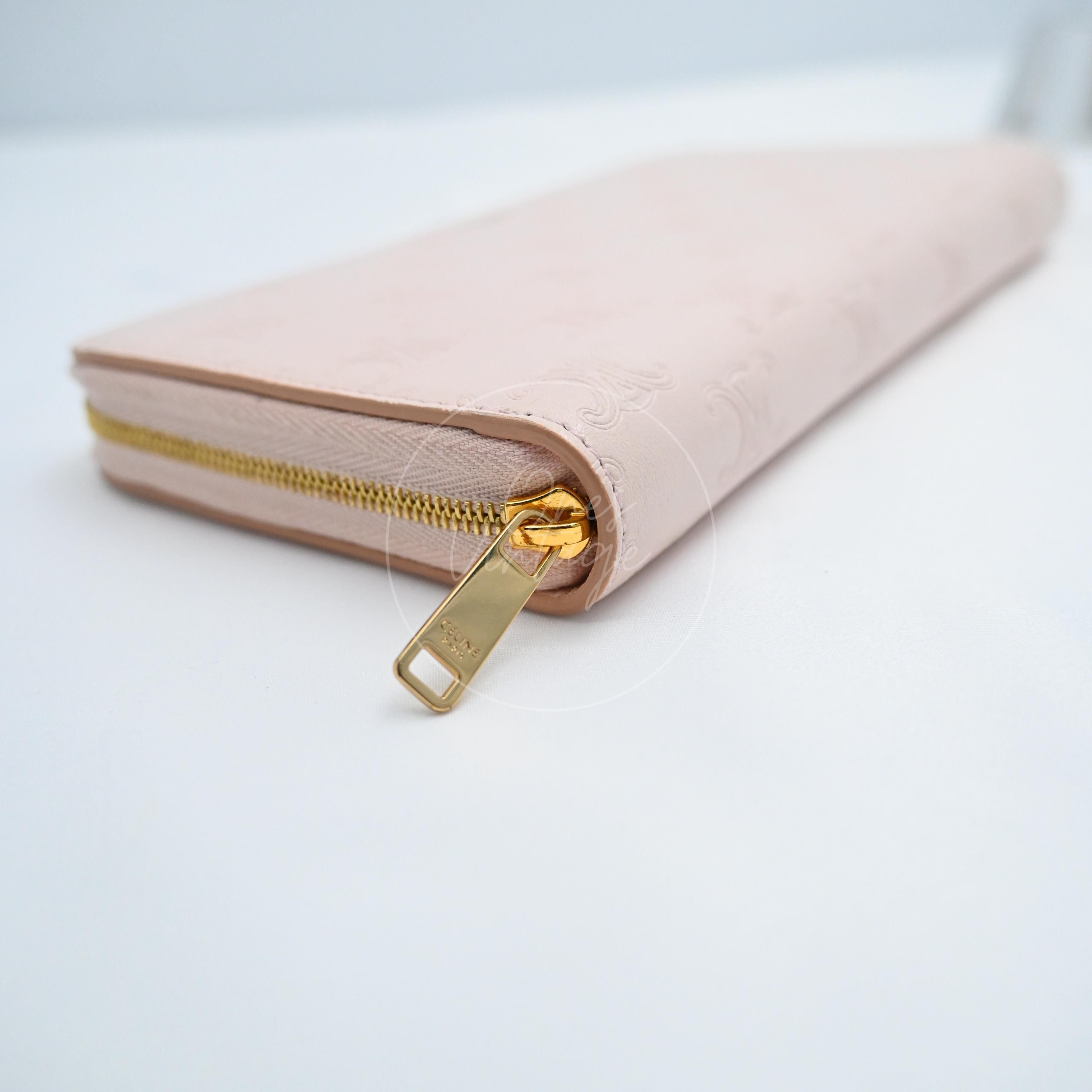 [Pre-owned] Celine Triomphe Embossed Pink Calfskin Zippy Long Wallet