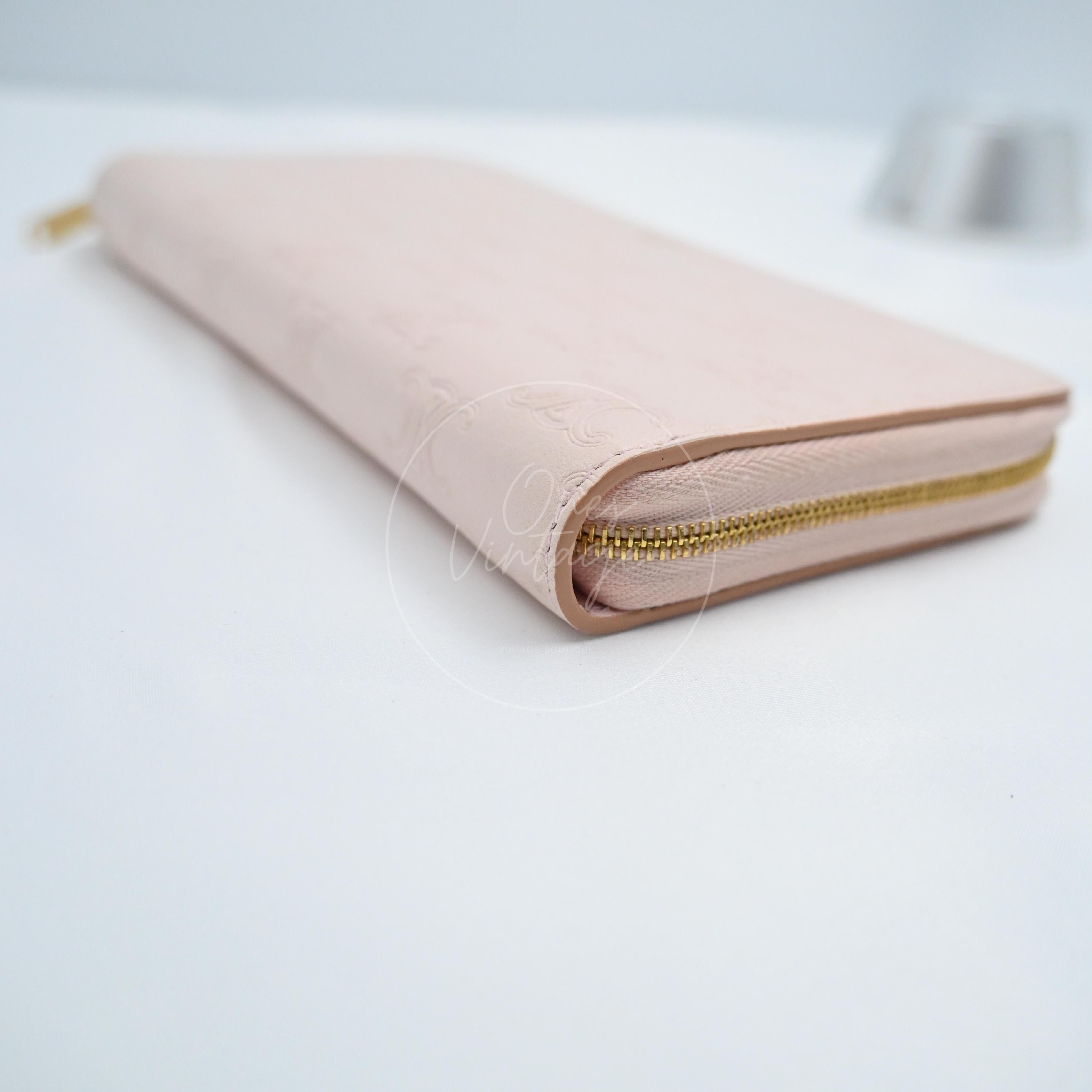 [Pre-owned] Celine Triomphe Embossed Pink Calfskin Zippy Long Wallet