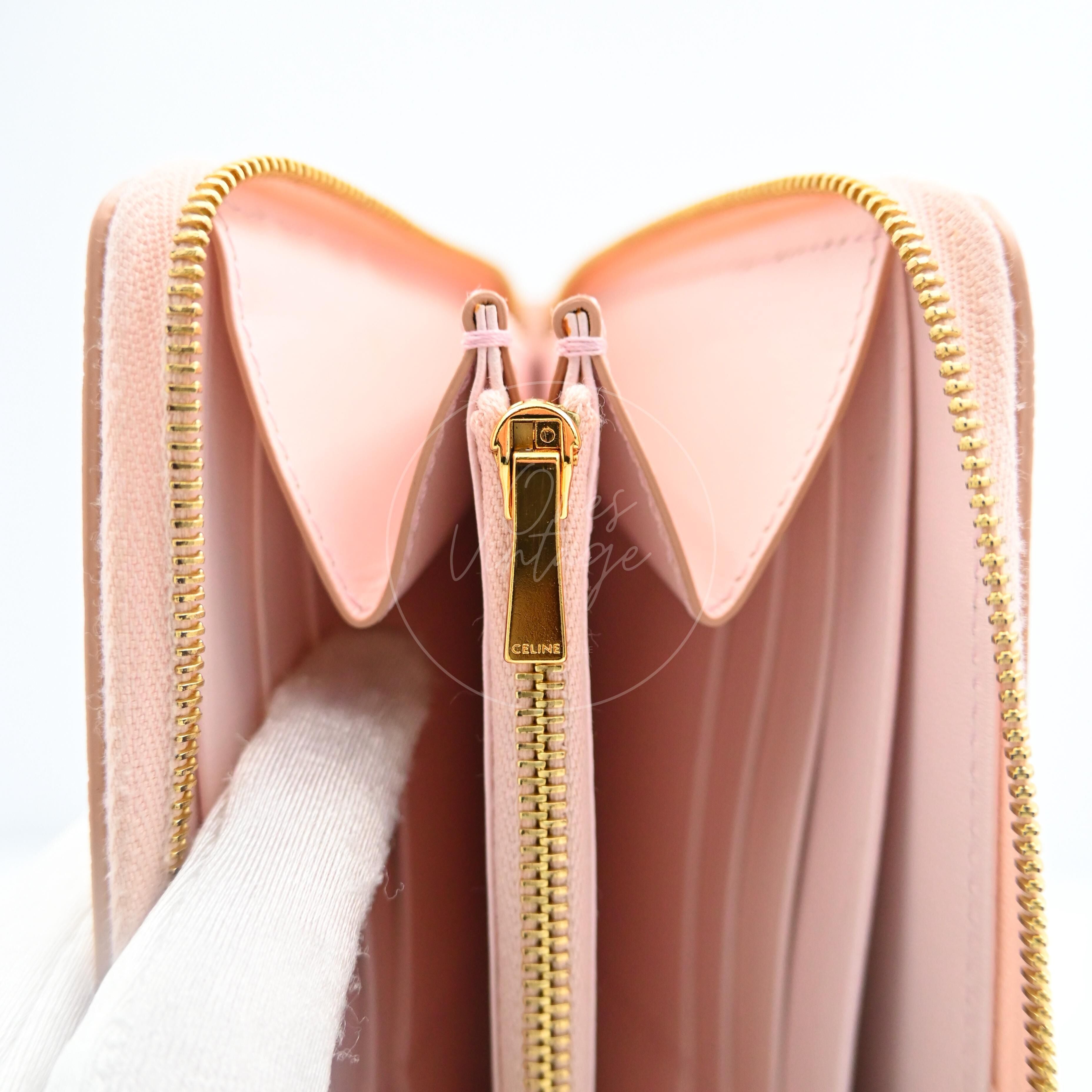 [Pre-owned] Celine Triomphe Embossed Pink Calfskin Zippy Long Wallet