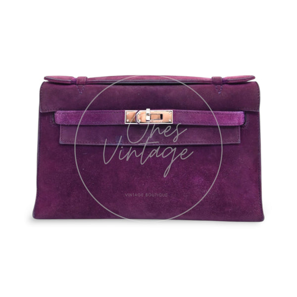 Hermès Kelly 22 Pochette clutch in violet Doblis suede with palladium hardware, Square H stamp, front view