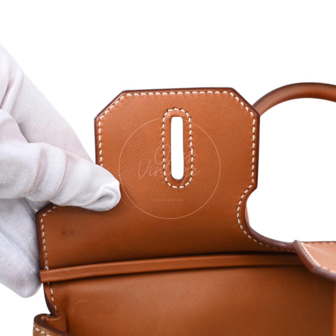 ```json
[
  {
    "translated_text": "[Pre-Owned] Hermes Birkin 30 Gold Brown Veau Doblis Grizzly Swift Stamp Square P"
  }
]
```