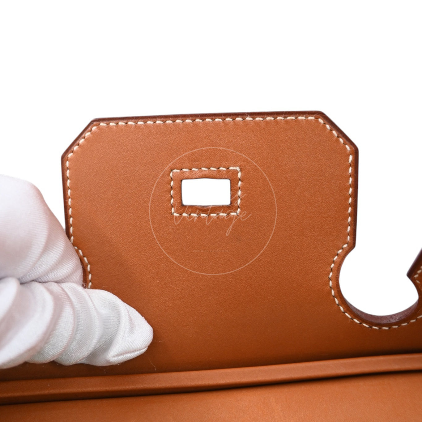```json
[
  {
    "translated_text": "[Pre-Owned] Hermes Birkin 30 Gold Brown Veau Doblis Grizzly Swift Stamp Square P"
  }
]
```