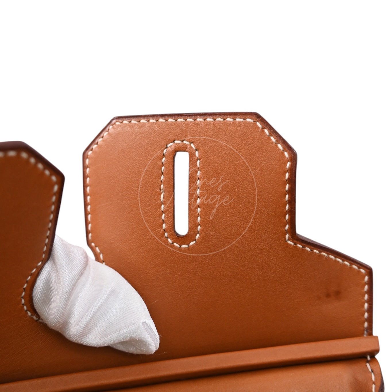 ```json
[
  {
    "translated_text": "[Pre-Owned] Hermes Birkin 30 Gold Brown Veau Doblis Grizzly Swift Stamp Square P"
  }
]
```