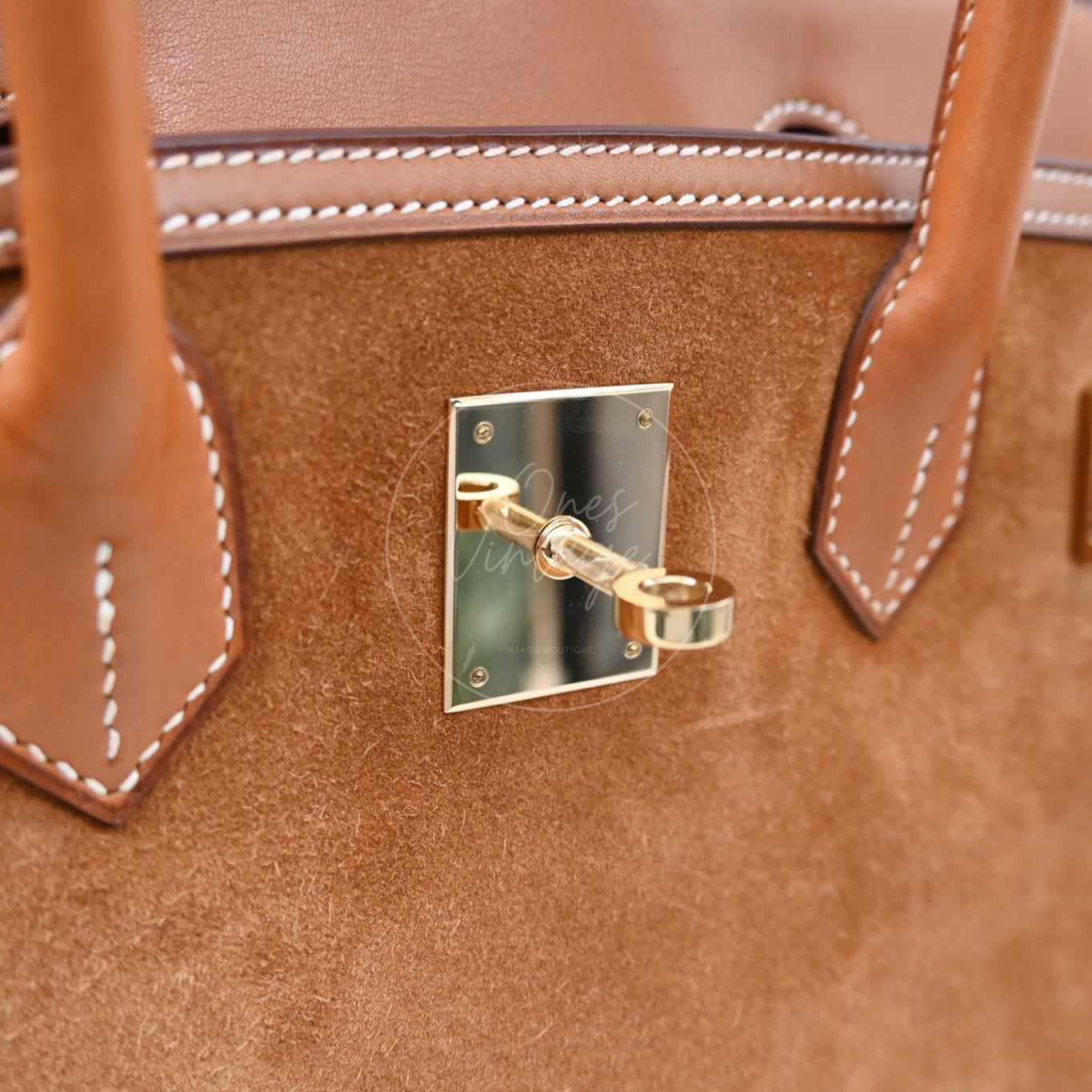 ```json
[
  {
    "translated_text": "[Pre-Owned] Hermes Birkin 30 Gold Brown Veau Doblis Grizzly Swift Stamp Square P"
  }
]
```