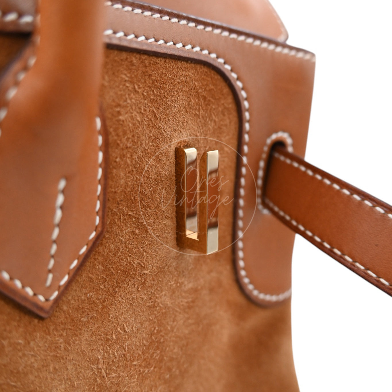 ```json
[
  {
    "translated_text": "[Pre-Owned] Hermes Birkin 30 Gold Brown Veau Doblis Grizzly Swift Stamp Square P"
  }
]
```