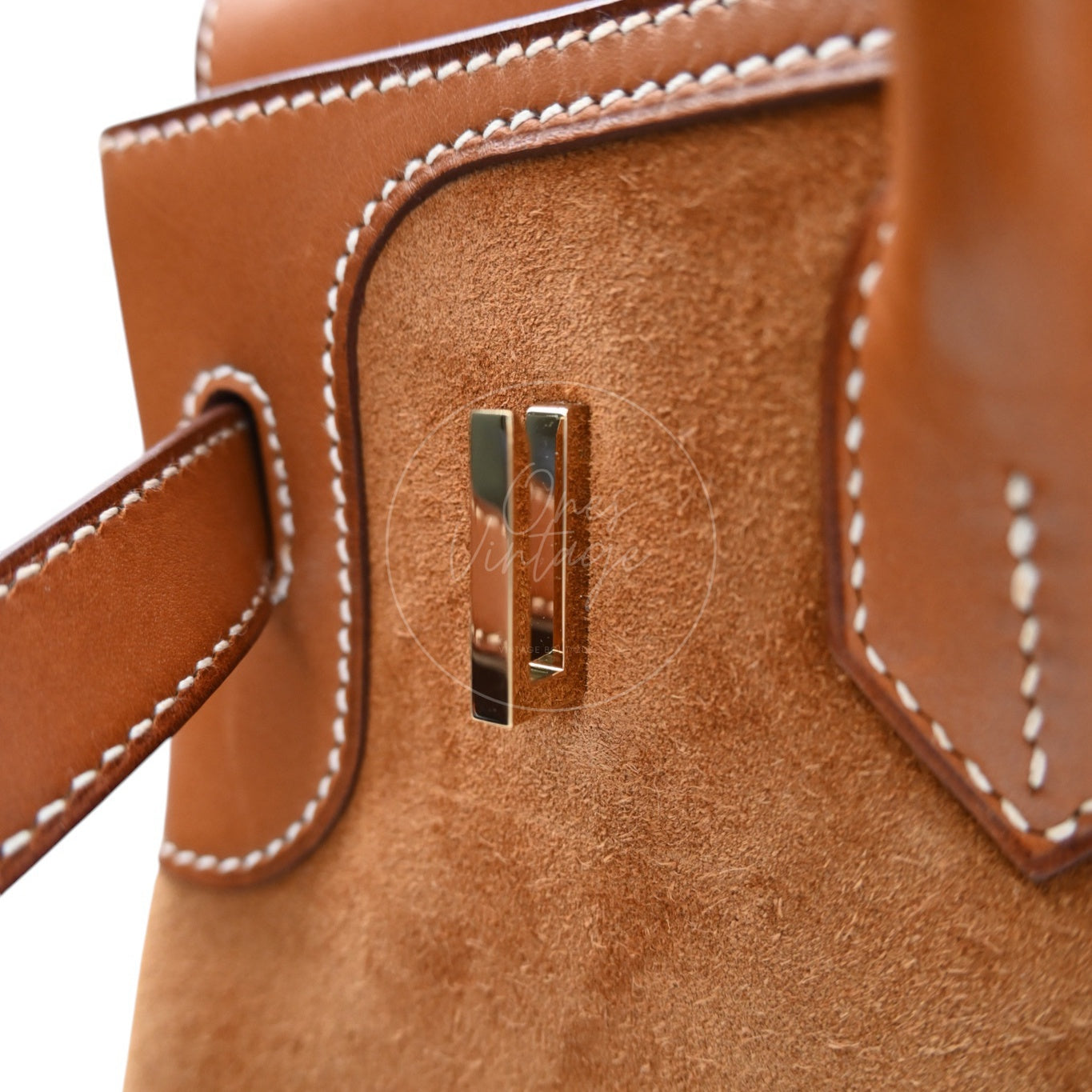 ```json
[
  {
    "translated_text": "[Pre-Owned] Hermes Birkin 30 Gold Brown Veau Doblis Grizzly Swift Stamp Square P"
  }
]
```