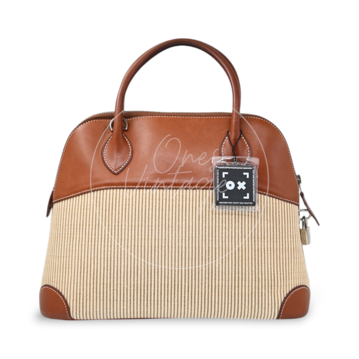 Hermès Bolide 26 in Fauve Barenia leather and Crinoline fabric with palladium-plated hardware, Square D stamp, rear view with authenticity tag