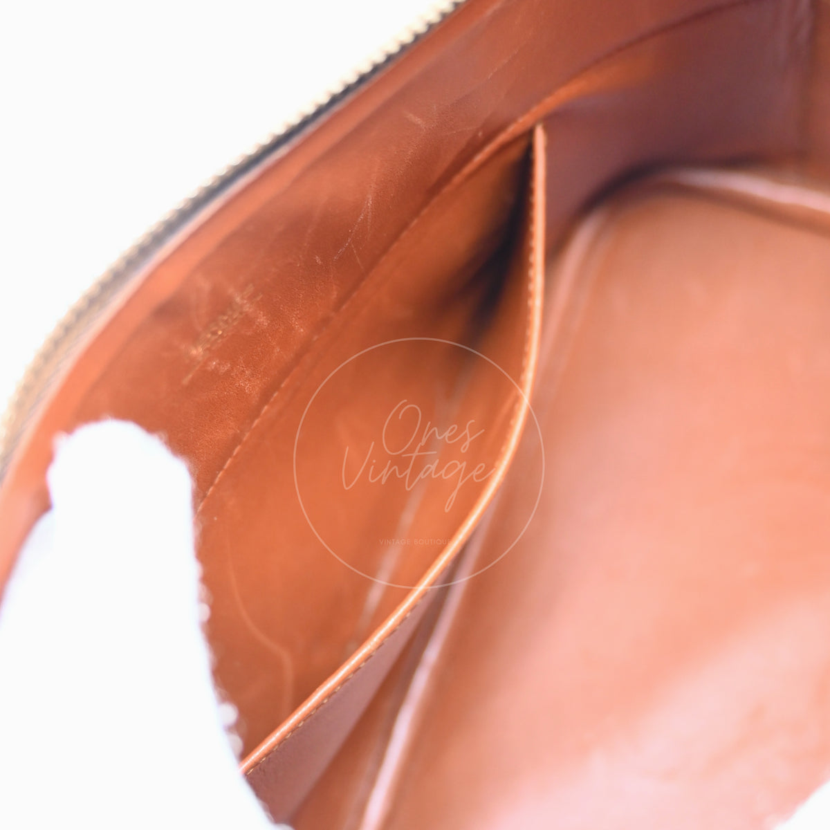 Hermès Bolide 27 in brown suede and leather with gold-tone hardware, Stamp J, interior slip pocket close-up