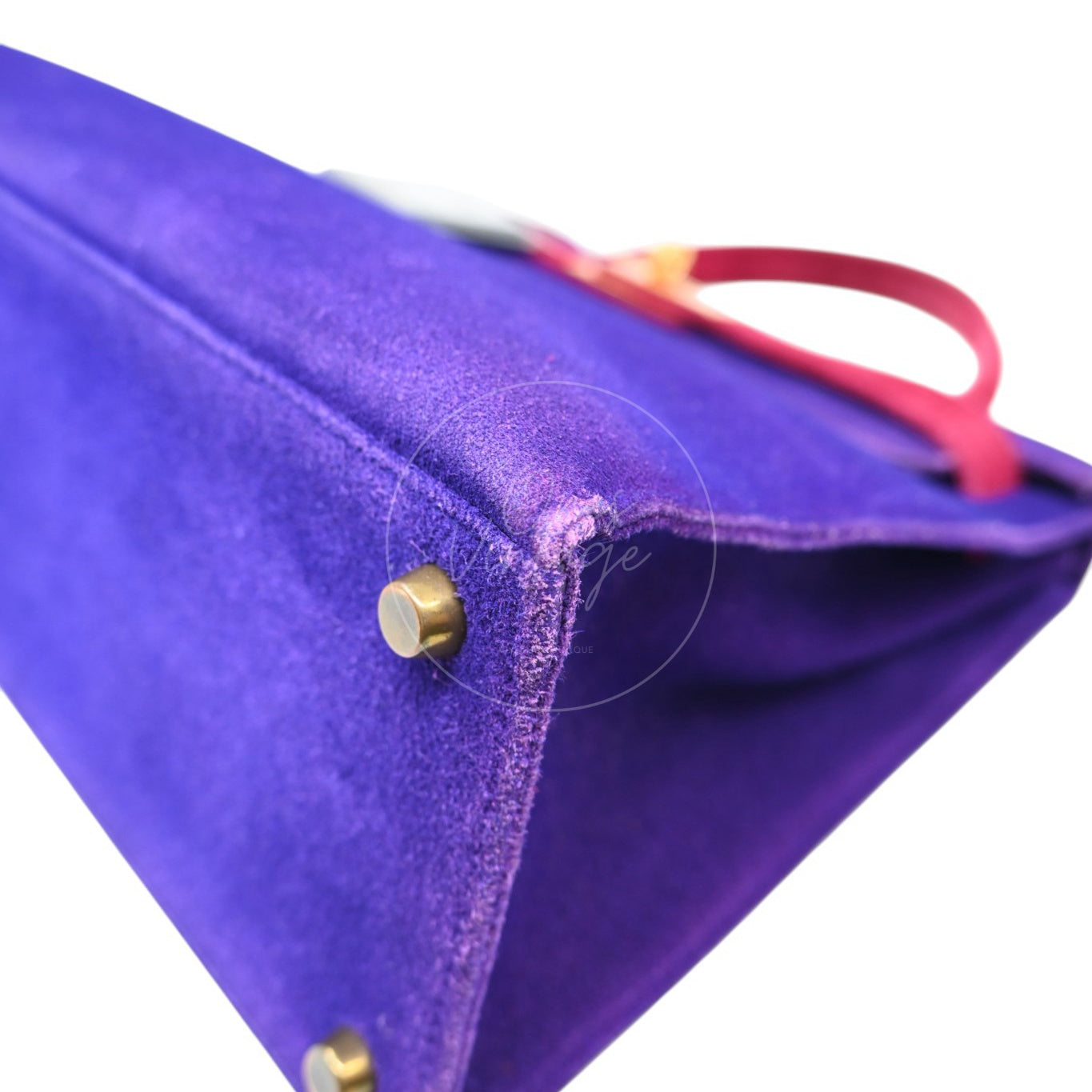 Hermès Kelly 28 Sellier in violet and pink Doblis suede with gold-tone hardware, front right base corner and protective foot
