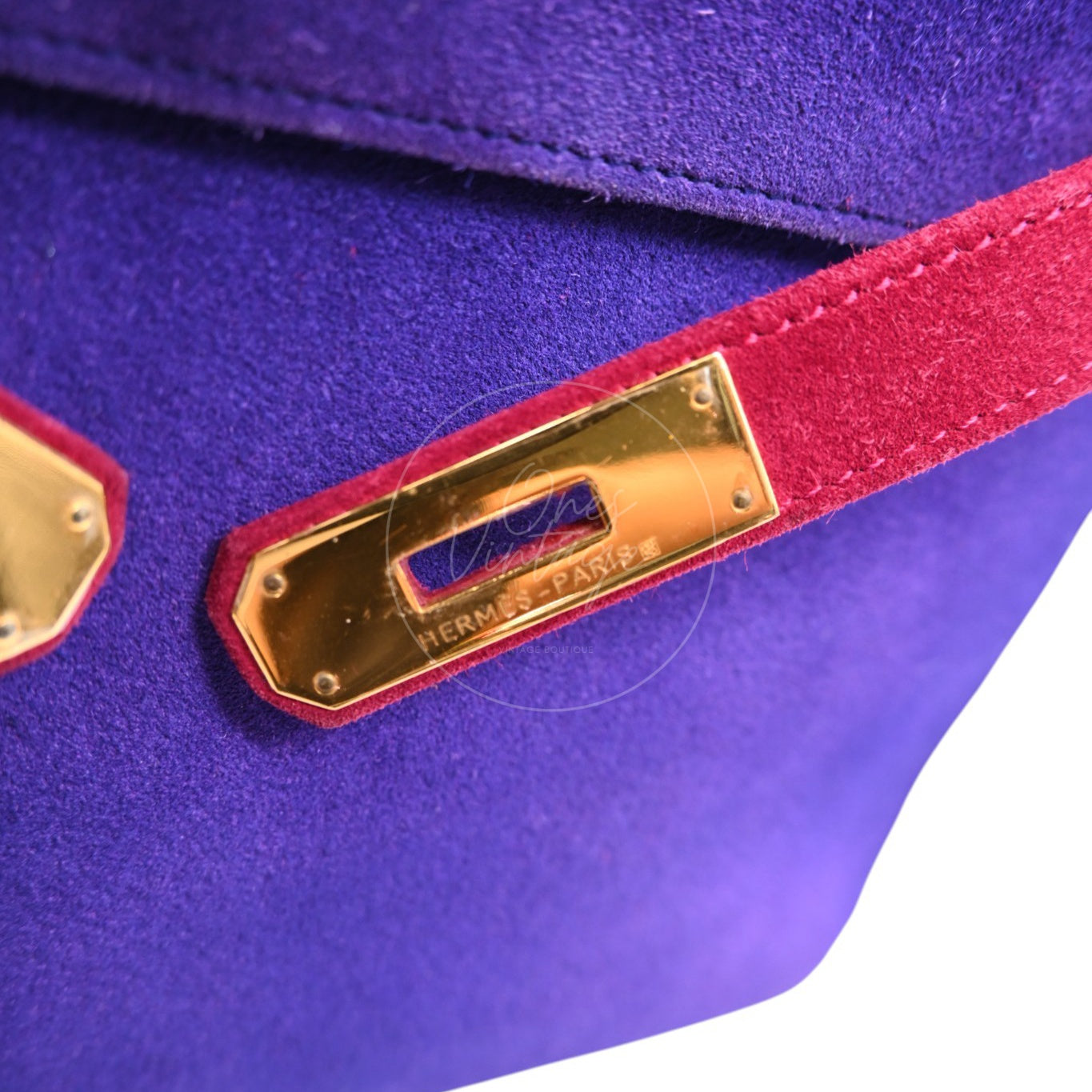 Hermès Kelly 28 Sellier in violet and pink Doblis suede with gold-tone hardware, gold-tone closure plate on the pink strap