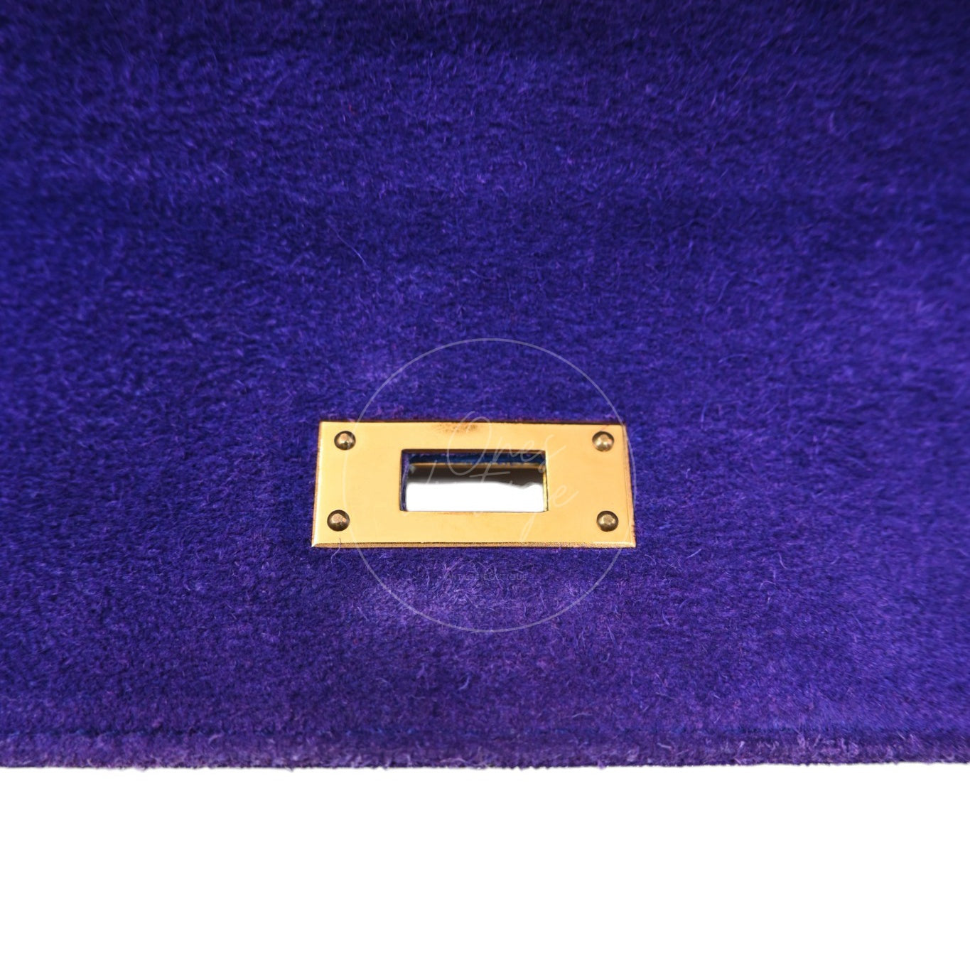 Hermès Kelly 28 Sellier in violet and pink Doblis suede with gold-tone hardware, interior closure plate close-up