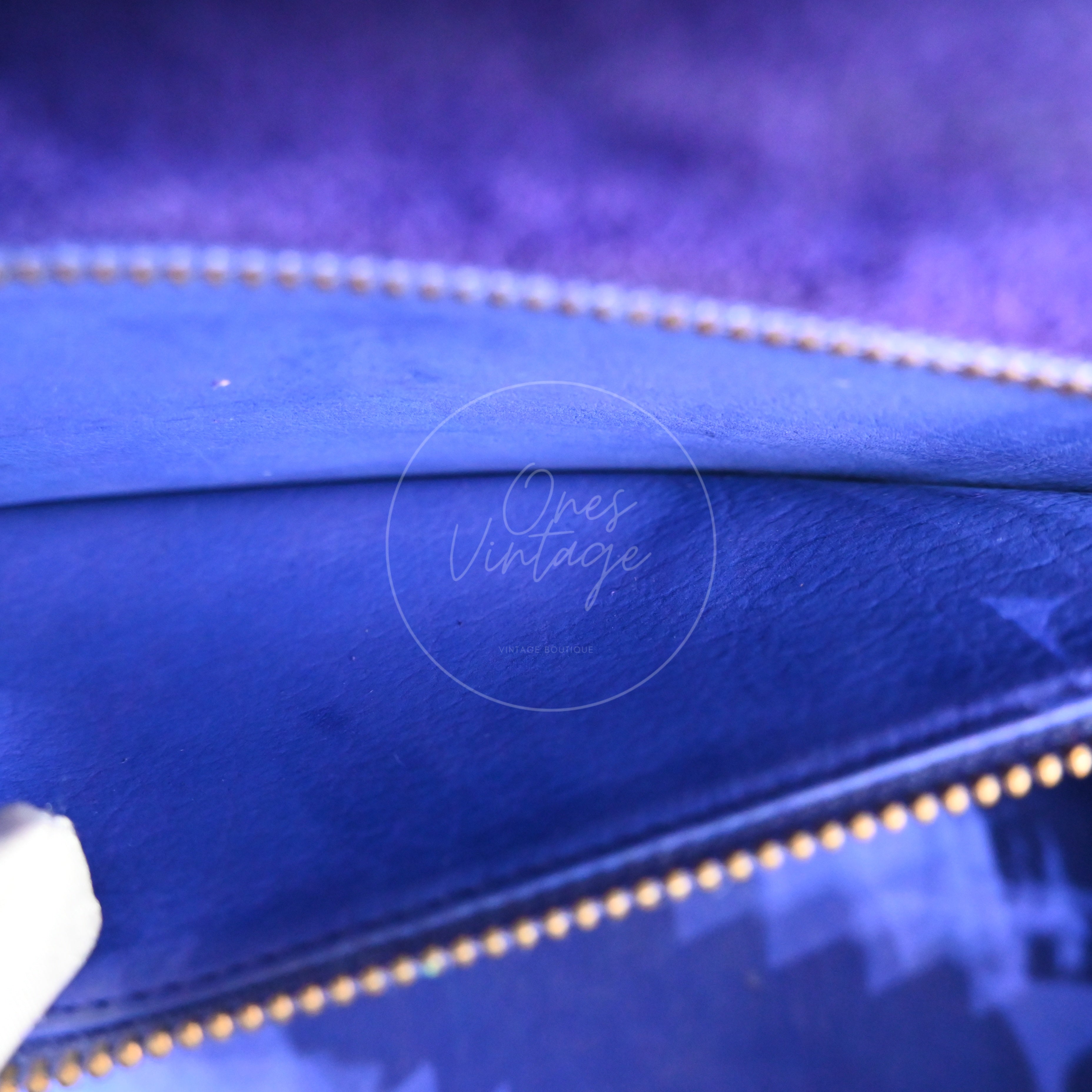 Hermès Kelly 28 Sellier in violet and pink Doblis suede with gold-tone hardware, inside of the zip pocket