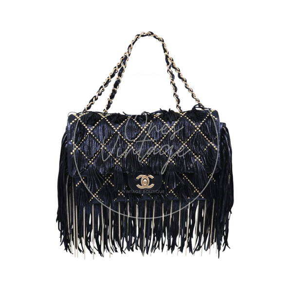 Chanel Paris-Dallas fringe calfskin flap bag in navy with gold-tone hardware, Series 19, front view with long leather fringe