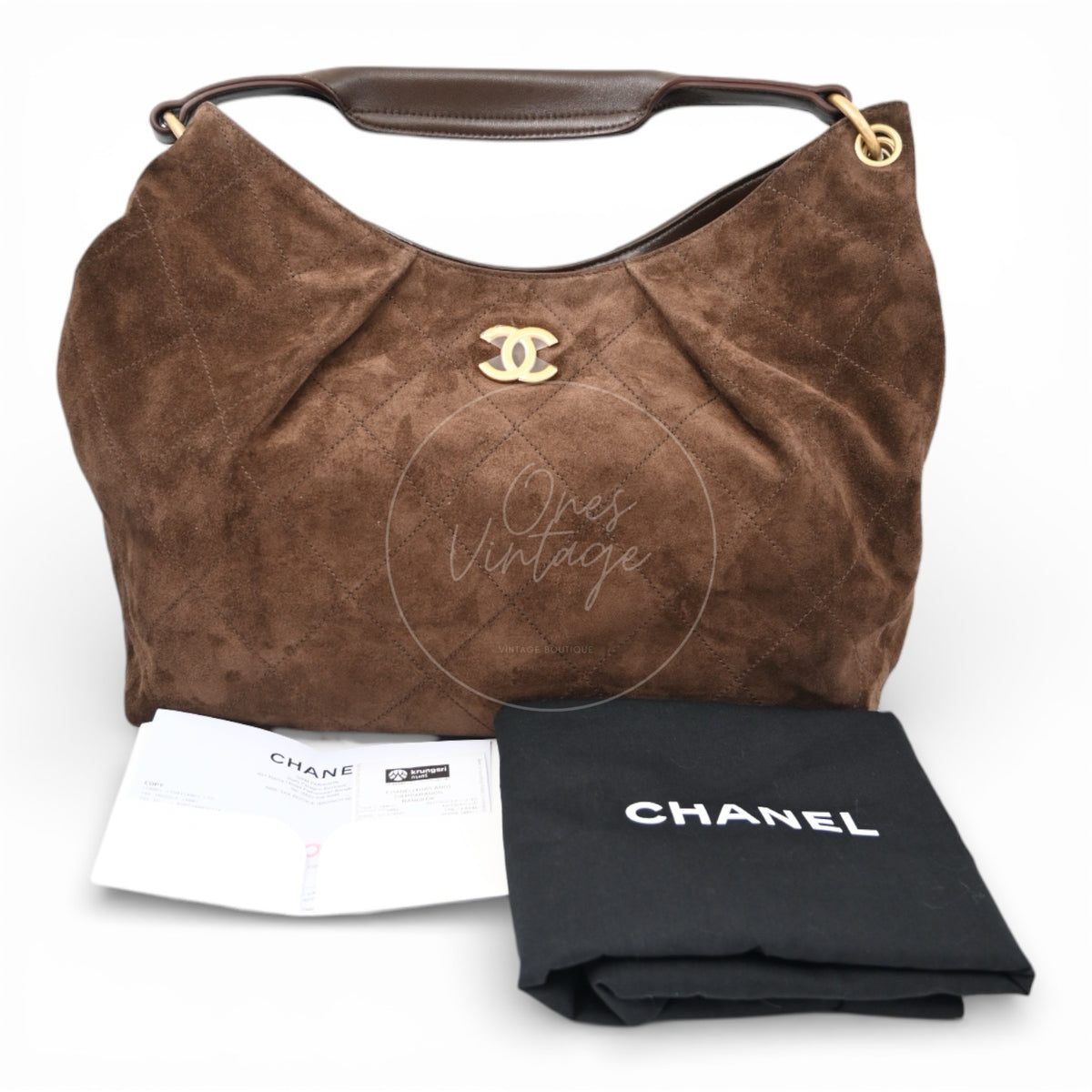 Chanel Cruise 25/26 Maxi Hobo Bag in dark brown suede calfskin, lambskin, featuring curved top handle with dust bag and paperwork, front view