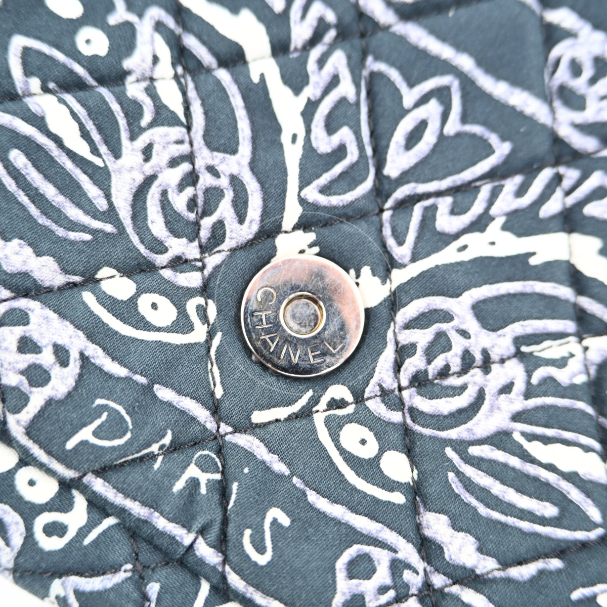 Chanel Small Bandana Single Flap in black quilted cotton, circular engraved button detail