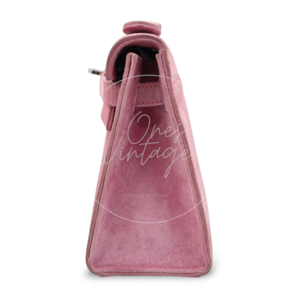 Hermès Kelly Pochette Veau Doblis in pink suede with palladium hardware, featuring top handle and gusseted construction, left side view
