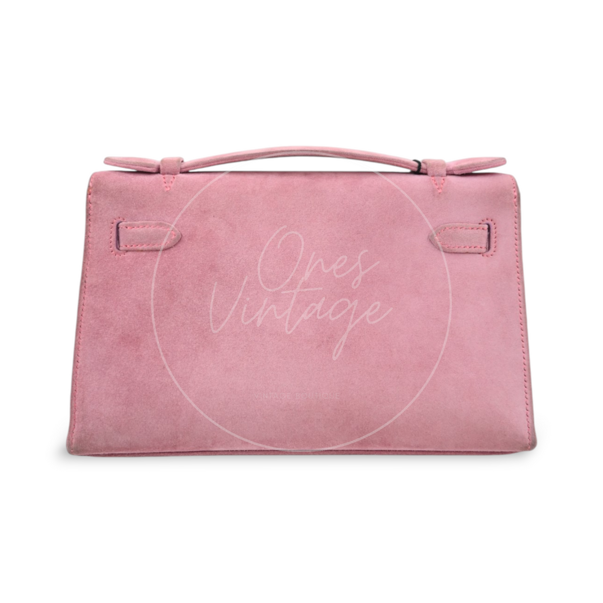 Hermès Kelly Pochette Veau Doblis in pink suede with palladium hardware, featuring top handle and structured rectangular silhouette, front view